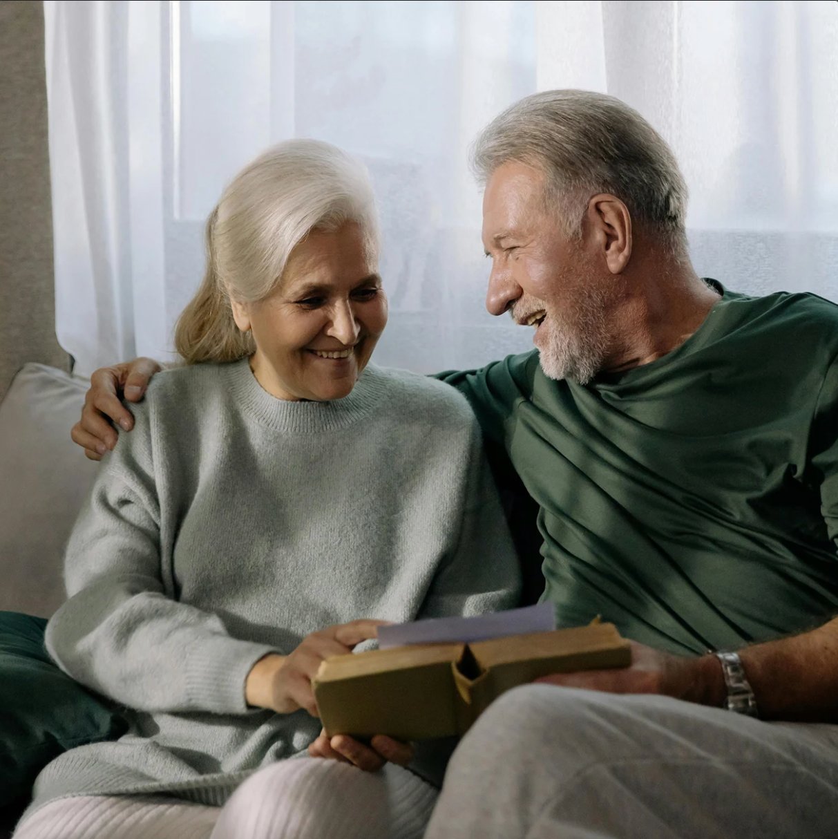 An older couple sharing a warm moment together at home